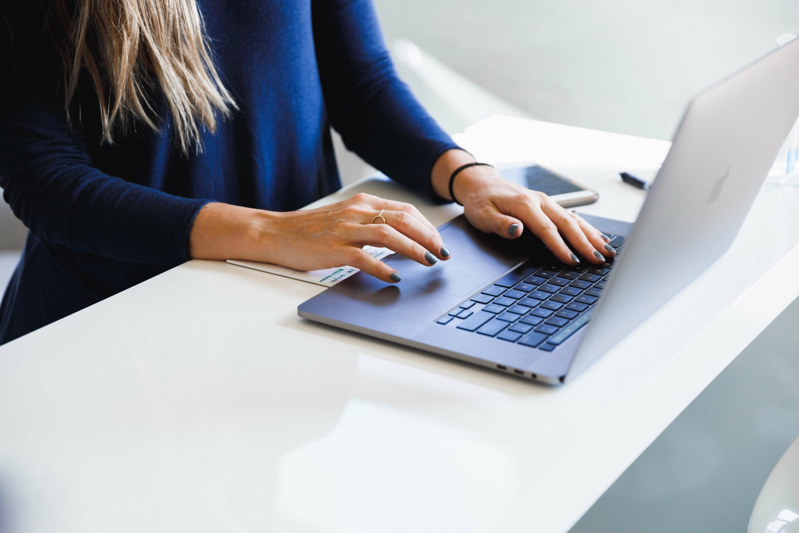 Woman typing google docs shortcuts